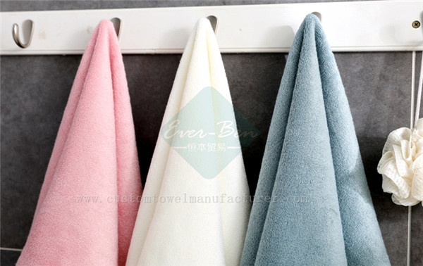 China Bulk Custom white hooded towel poncho supplier